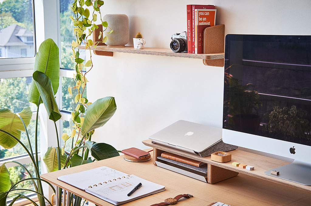Stylish looking desk with iMac and MacBook Pro